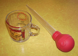 Coffee mug and turkey baster